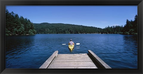 Framed Rear view of a man on a kayak in a river, Orcas Island, Washington State, USA Print