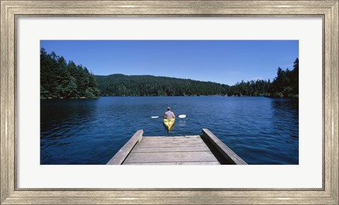 Framed Rear view of a man on a kayak in a river, Orcas Island, Washington State, USA Print