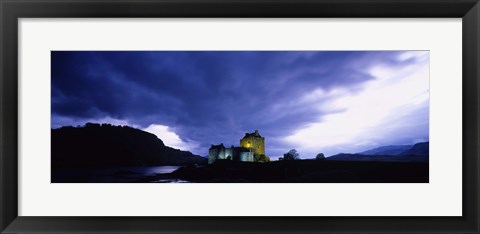 Framed Low Angle View Of A Castle Lit Up At Dusk, Eilean Donan Castle, Highlands, Scotland, United Kingdom Print