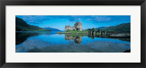 Framed Reflection of a castle in water, Eilean Donan Castle, Loch Duich, Highlands, Scotland Print