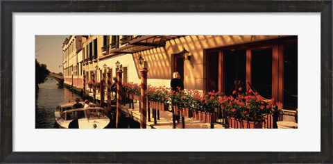 Framed Boat outside of a tourist resort, Venice, Italy Print
