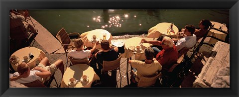 Framed High angle view of tourists sitting along a canal, Venice, Italy Print