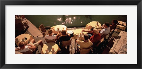 Framed High angle view of tourists sitting along a canal, Venice, Italy Print