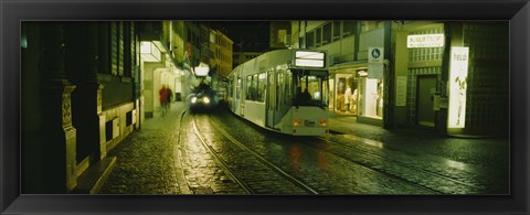 Framed Cable Cars Moving On A Street, Freiburg, Germany Print