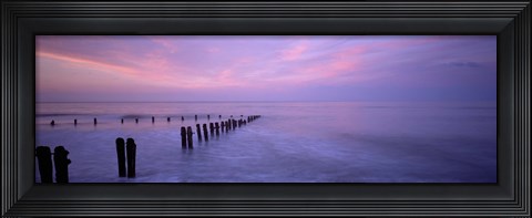Framed Wooden Posts In Water, Sandsend, Yorkshire, England, United Kingdom Print