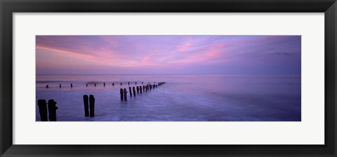 Framed Wooden Posts In Water, Sandsend, Yorkshire, England, United Kingdom Print