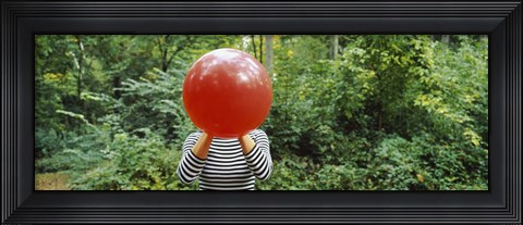 Framed Woman blowing a balloon, Germany Print