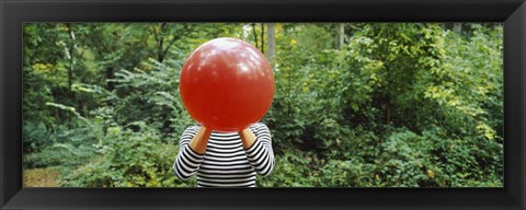 Framed Woman blowing a balloon, Germany Print