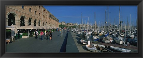 Framed Pedestrian walkway along a harbor, Barcelona, Catalonia, Spain Print