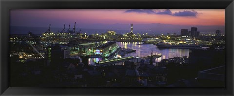 Framed High angle view of city at a port lit up at dusk, Genoa, Liguria, Italy Print