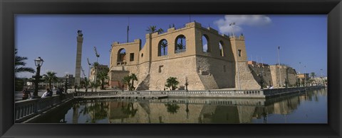 Framed Reflection of a building in a pond, Assai Al-Hamra, Tripoli, Libya Print