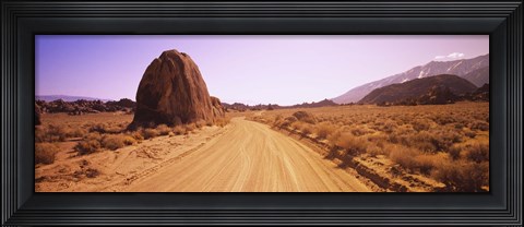 Framed Dirt road passing through an arid landscape, Californian Sierra Nevada, California, USA Print