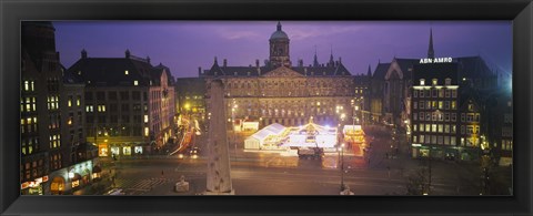 Framed High angle view of a town square lit up at dusk, Dam Square, Amsterdam, Netherlands Print