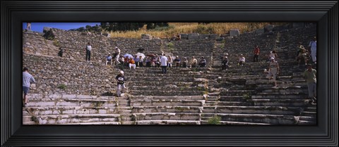 Framed Tourists at old ruins of an amphitheater, Odeon, Ephesus, Turkey Print