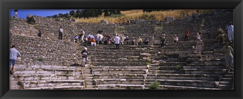 Framed Tourists at old ruins of an amphitheater, Odeon, Ephesus, Turkey Print