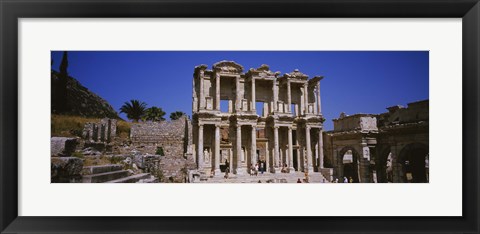 Framed Tourists in front of the old ruins of a library, Library At Epheses, Ephesus, Turkey Print