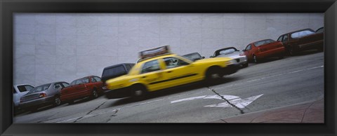 Framed Taxi running on the road, San Francisco, California, USA Print