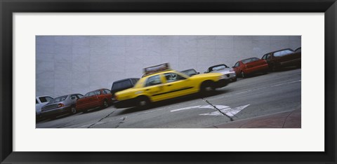 Framed Taxi running on the road, San Francisco, California, USA Print