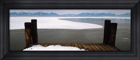 Framed Frozen lake in front of snowcapped mountains, Chiemsee, Bavaria, Germany Print