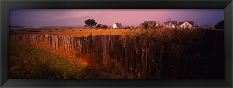 Framed Wooden fence in a field with houses in the background, Mendocino, California, USA Print