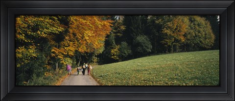 Framed Group of people walking on a walkway in a park, St. Peter, Black Forest, Baden-Wurttemberg, Germany Print
