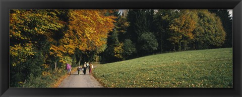 Framed Group of people walking on a walkway in a park, St. Peter, Black Forest, Baden-Wurttemberg, Germany Print