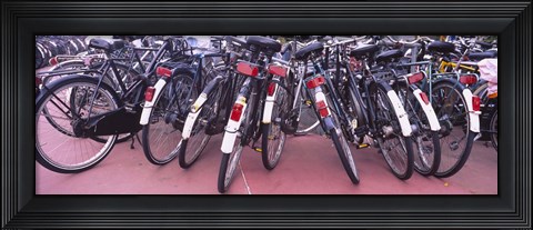 Framed Bicycles parked in a parking lot, Amsterdam, Netherlands Print