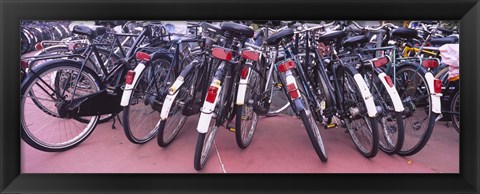 Framed Bicycles parked in a parking lot, Amsterdam, Netherlands Print