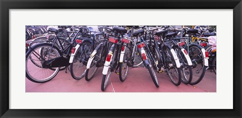 Framed Bicycles parked in a parking lot, Amsterdam, Netherlands Print