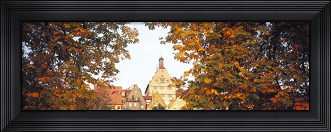 Framed Low angle view of buildings viewed through trees, Bietigheim, Baden-Wurttemberg, Germany Print