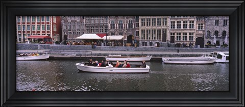 Framed High angle view of tourboats in a river, Leie River, Graslei, Ghent, Belgium Print