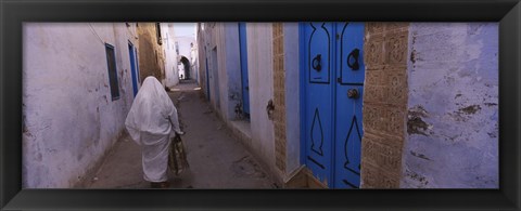 Framed Rear view of a woman walking on the street, Medina, Kairwan, Tunisia Print