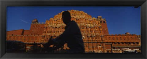 Framed Silhouette of a person riding a motorcycle in front of a palace, Hawa Mahal, Jaipur, Rajasthan, India Print