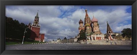 Framed Low angle view of a cathedral, St. Basil&#39;s Cathedral, Spasskaya Tower, Kremlin, Moscow, Russia Print