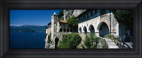 Framed Walkway along a building at a lake, Santa Caterina del Sasso, Lake Maggiore, Piedmont, Italy Print