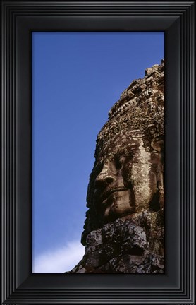 Framed Low angle view of a face carving, Angkor Wat, Cambodia Print