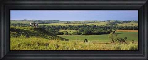 Framed Three mountain bikers on a hill, Kansas, USA Print