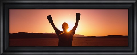 Framed Silhouette of a person wearing boxing gloves in a desert at dusk, Black Rock Desert, Nevada, USA Print