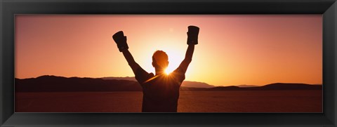 Framed Silhouette of a person wearing boxing gloves in a desert at dusk, Black Rock Desert, Nevada, USA Print