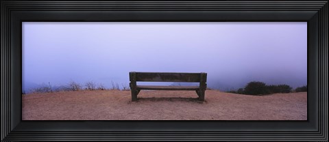 Framed Empty bench in a parking lot, California, USA Print