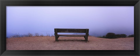 Framed Empty bench in a parking lot, California, USA Print