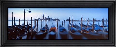 Framed Row of gondolas moored near a jetty, Venice, Italy Print