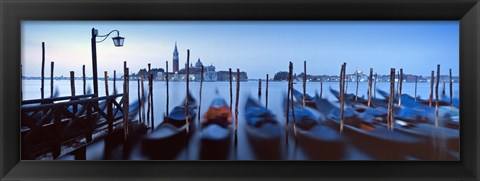 Framed Row of gondolas moored near a jetty, Venice, Italy Print