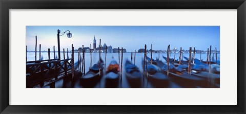 Framed Row of gondolas moored near a jetty, Venice, Italy Print