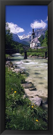 Framed Bridge over stream below country church, Bavarian Alps, Germany. Print