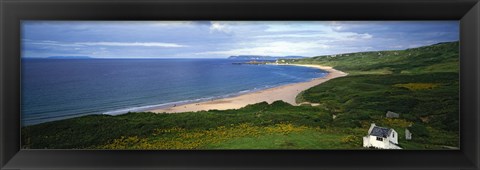 Framed Birds-eye view of sea, white stone cottage, Northern Ireland. Print