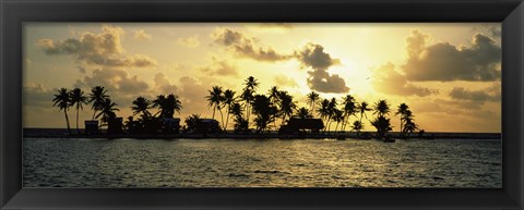 Framed Silhouette of palm trees on an island at sunset, Laughing Bird Caye, Victoria Channel, Belize Print