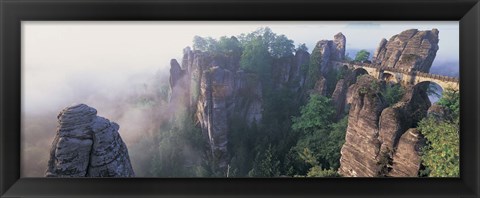 Framed Bridge passing through cliffs, Bastei Bridge, Saxon Switzerland National Park, Dresden, Saxony, Germany Print