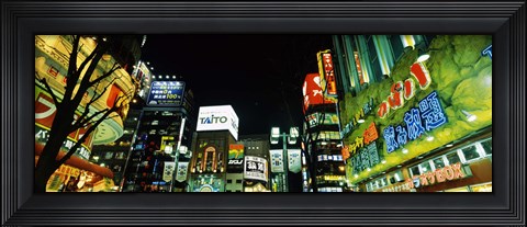 Framed Low angle view of buildings lit up at night, Shinjuku Ward, Tokyo Prefecture, Kanto Region, Japan Print