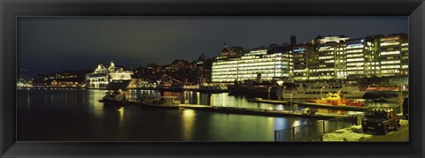 Framed Buildings in a city lit up at night, Sodermalm, Slussplan, Stockholm, Sweden Print